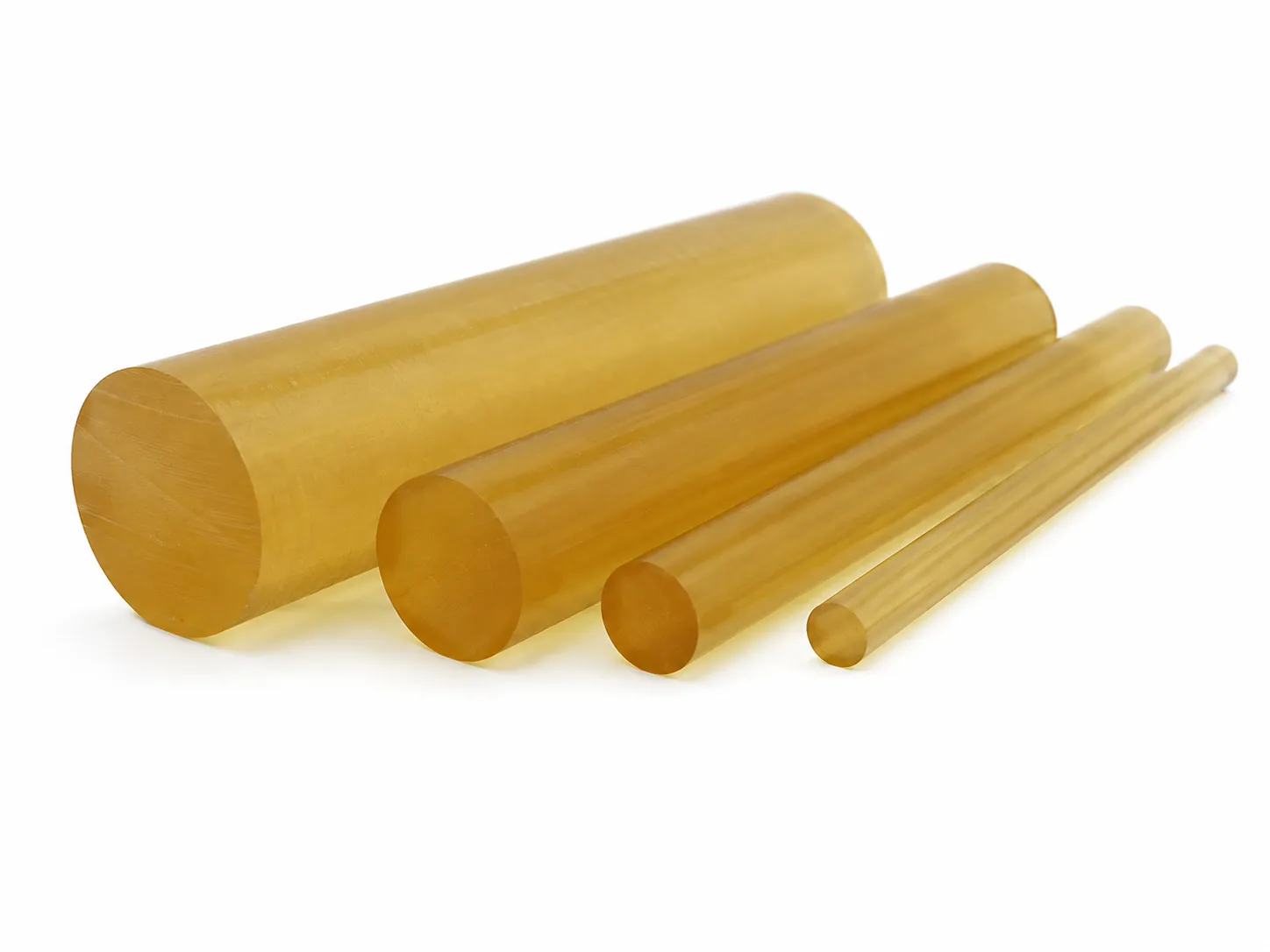 Natural amber PPSU polyphenylsulfone rod stock on a white background